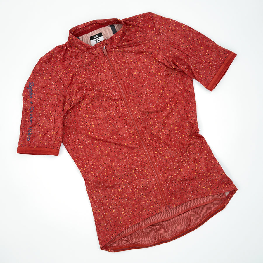 Rapha + Outdoor Voices Women's Jersey in terracotta terrazzo print, angled front view