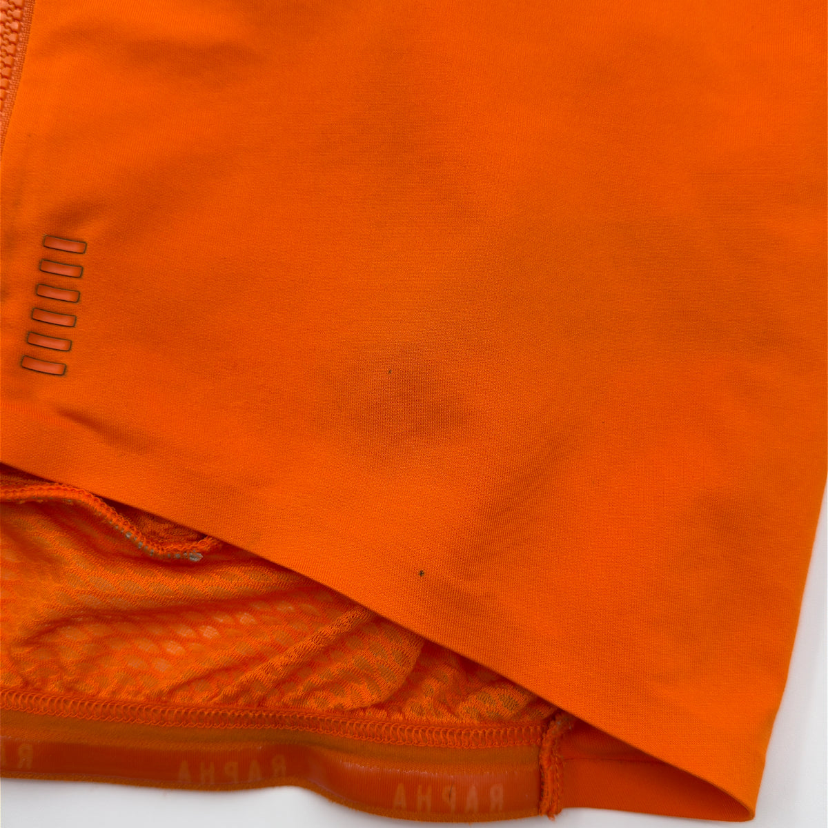 Rapha Men's Pro Team Midweight Jersey lower front hem close-up showing small spots