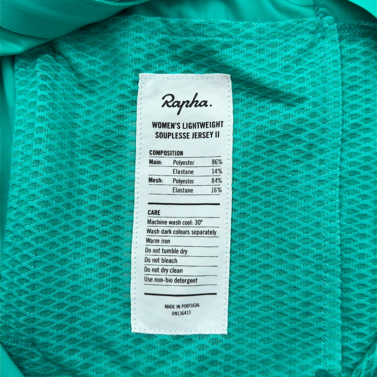 Rapha Women's Lightweight Souplesse Jersey II care label showing composition