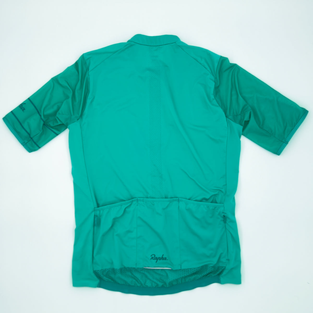 Rapha Women's Lightweight Souplesse Jersey II rear view showing perforated spine venting and three pockets