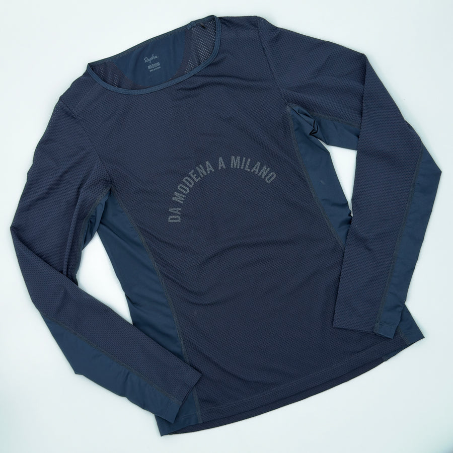 Rapha Women's Long Sleeve Base Layer angled view showing Da Modena a Milano arc print