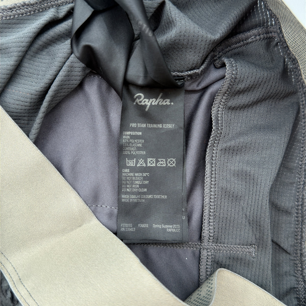 Rapha Pro Team Training Jersey care label showing composition and Spring Summer 2020 season code