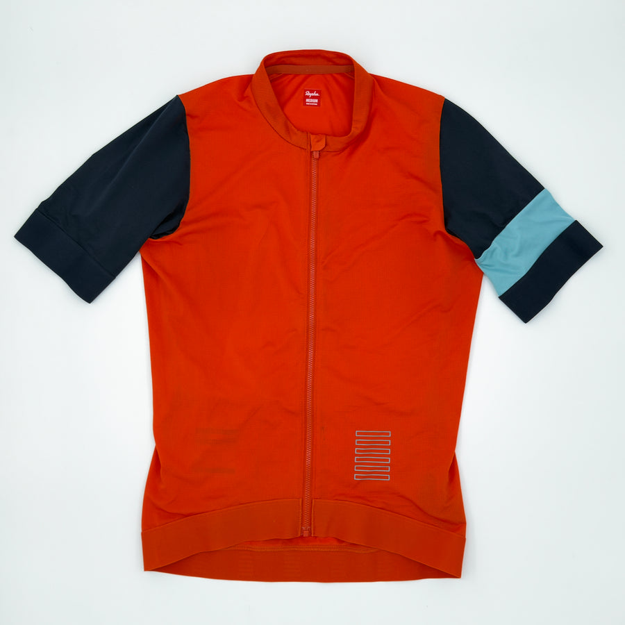 Rapha Pro Team Training Jersey angled front showing navy sleeves and pale blue arm band (alternate view)