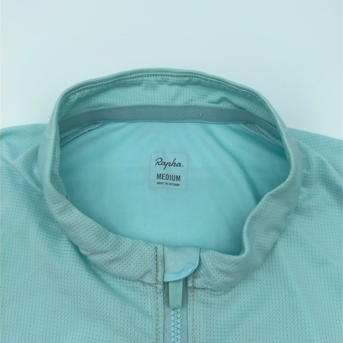 Rapha Pro Team Training Jersey neck label reading Medium, Made in Vietnam
