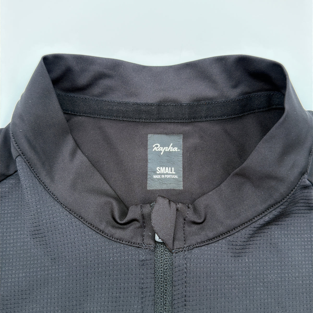 Rapha Pro Team Climber's Jersey neck label reading Small, Made in Portugal