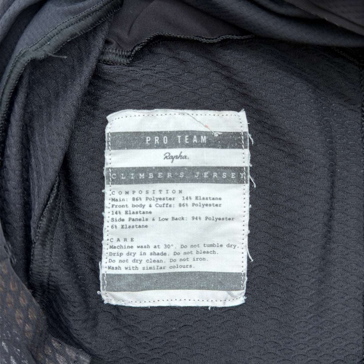 Rapha care label confirming Pro Team Climber's Jersey and panel compositions