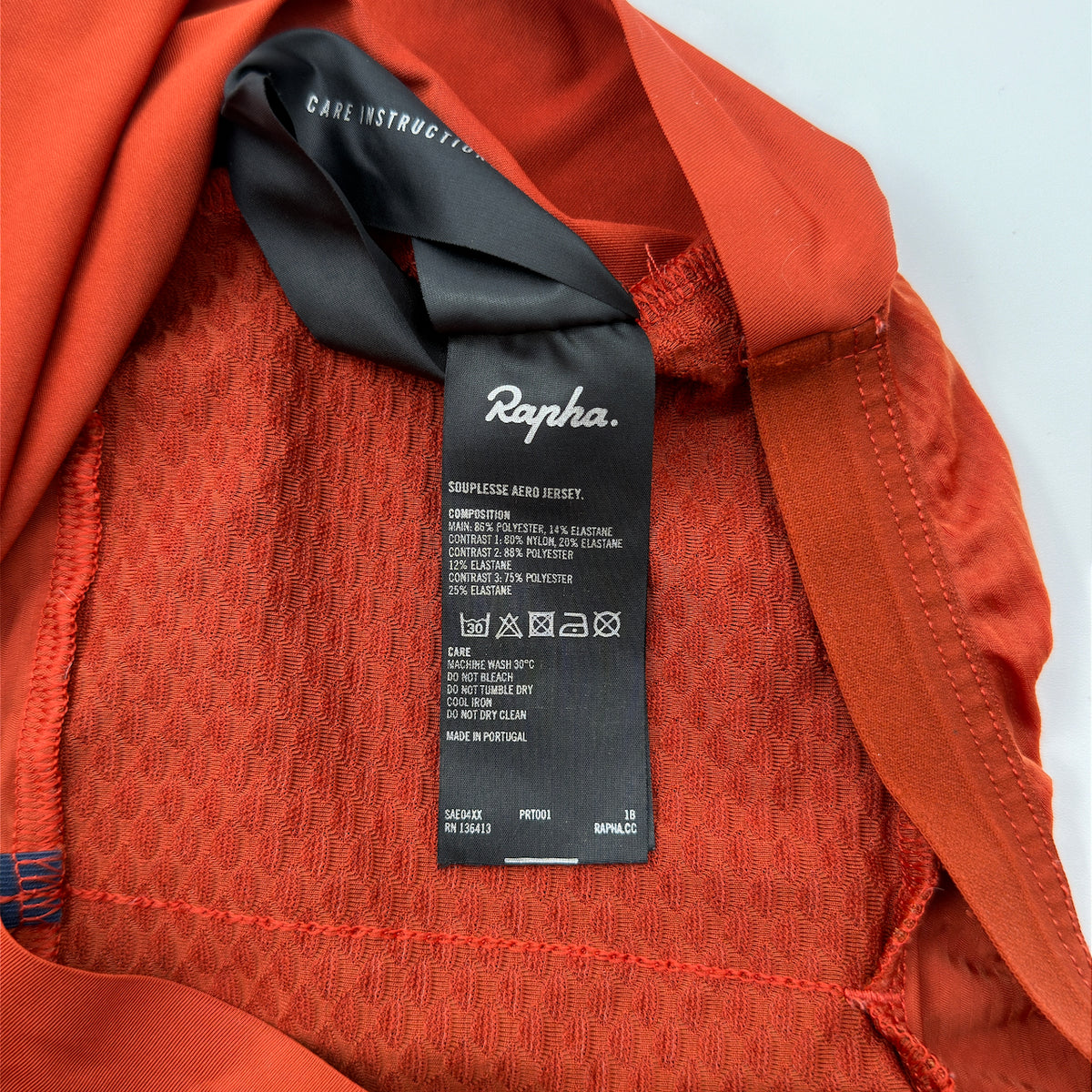 Rapha care label confirming Souplesse Aero Jersey composition and made in Portugal