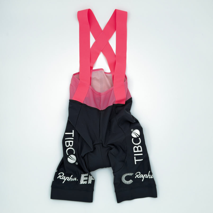 Rapha EF Education-TIBCO-SVB women's bib shorts front showing coral straps and TIBCO leg print (alternate view)