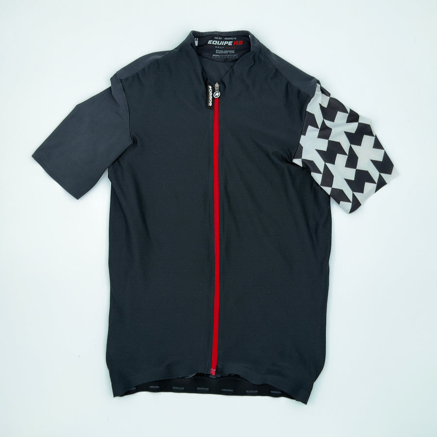 ASSOS Equipe RS Aero short sleeve jersey in black with white sleeve panels, laid flat front view (alternate view)