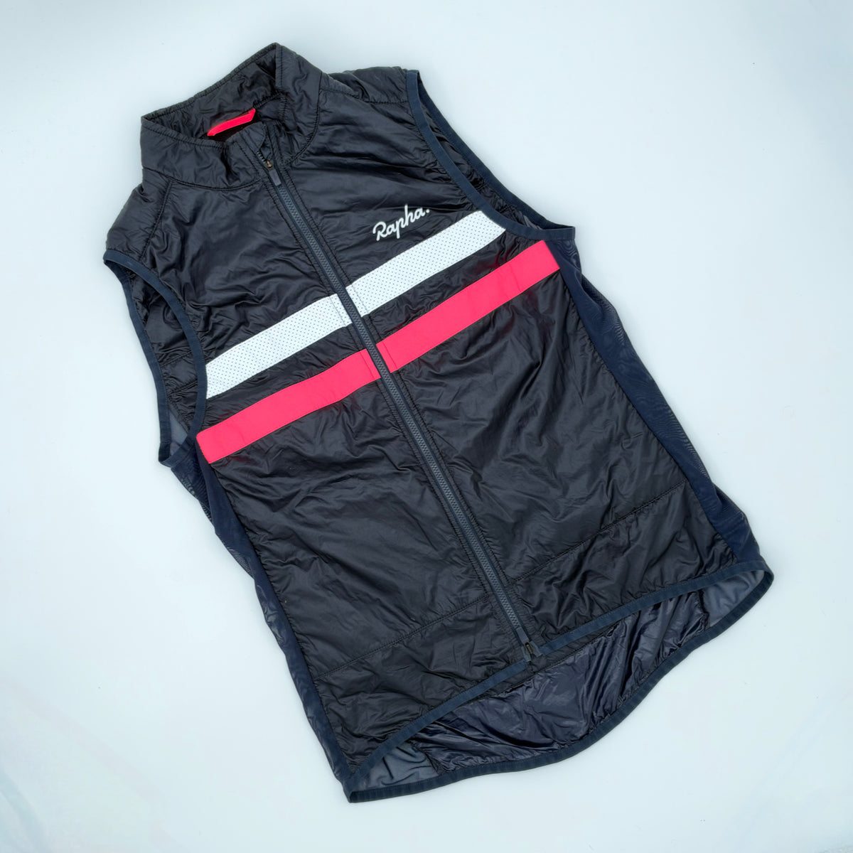 Angled front view showing quilted insulated panels and full-length zip