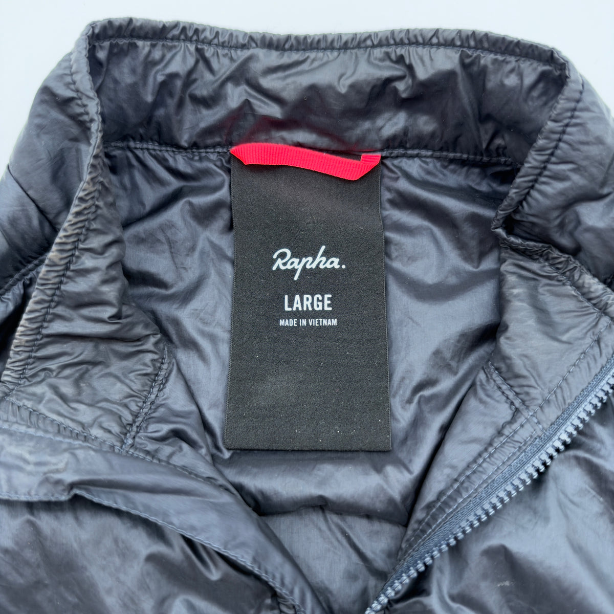 Rapha neck label confirming size Large, made in Vietnam