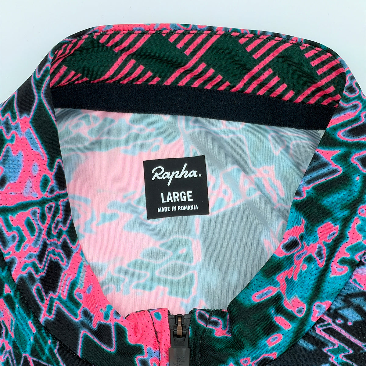 Rapha neck label confirming size Large, made in Romania