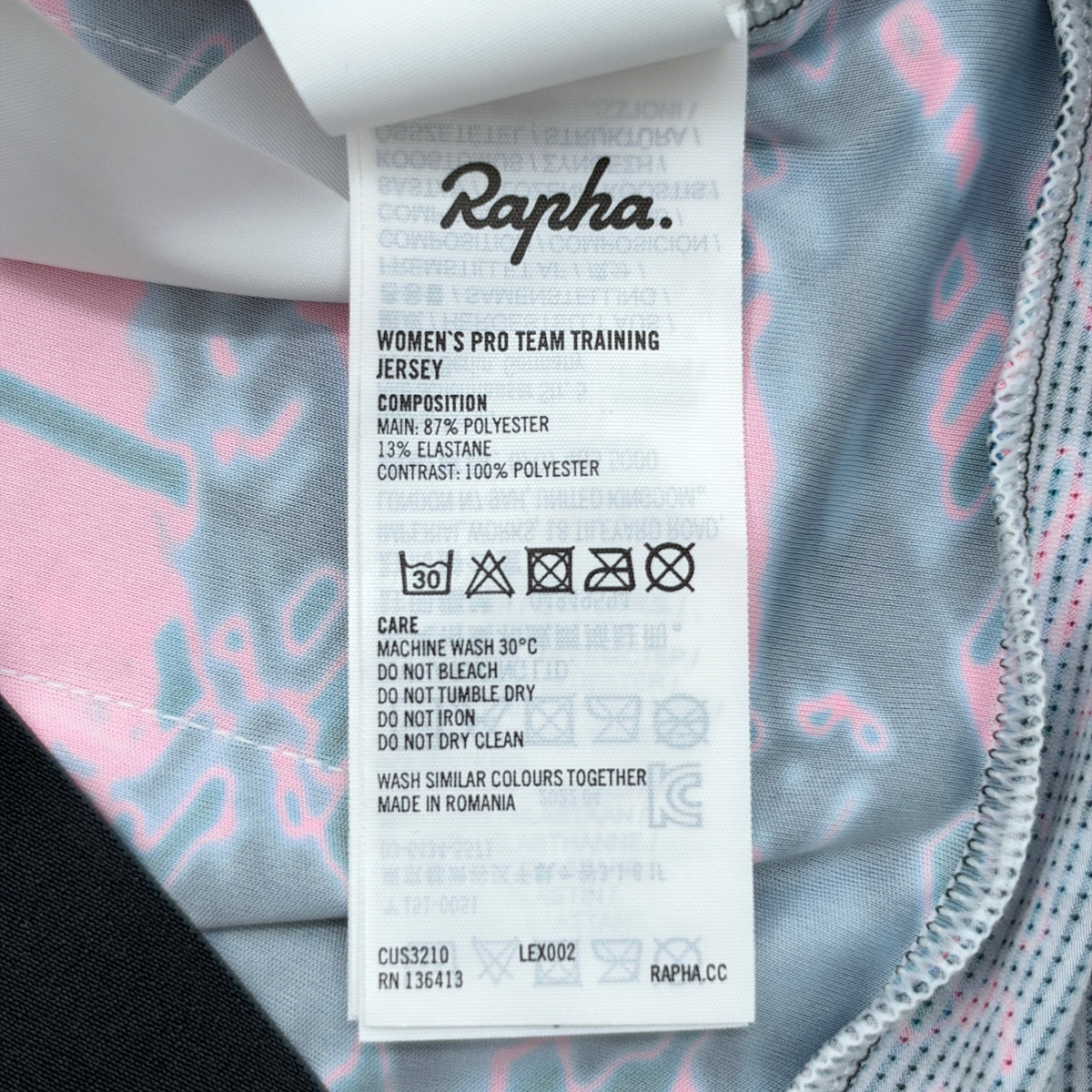 Care label showing Women's Pro Team Training Jersey composition and wash instructions