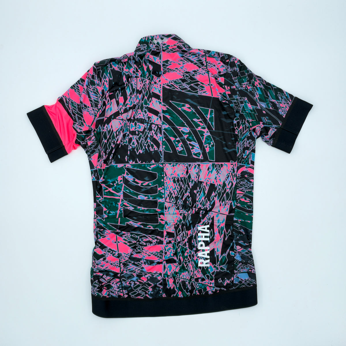 Rear view showing three pockets, RAPHA rear print and gripper hem