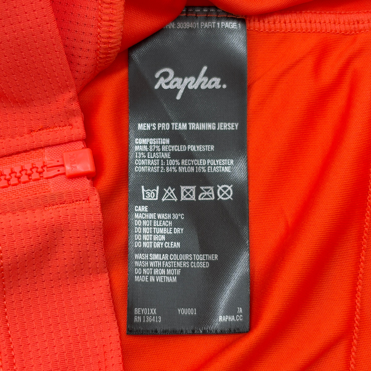 Care label showing Men's Pro Team Training Jersey composition and wash instructions