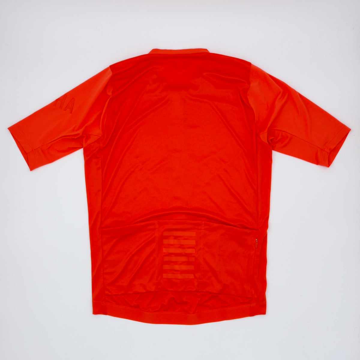 Rear view showing three pockets, zipped valuables pocket and reflective bar detail