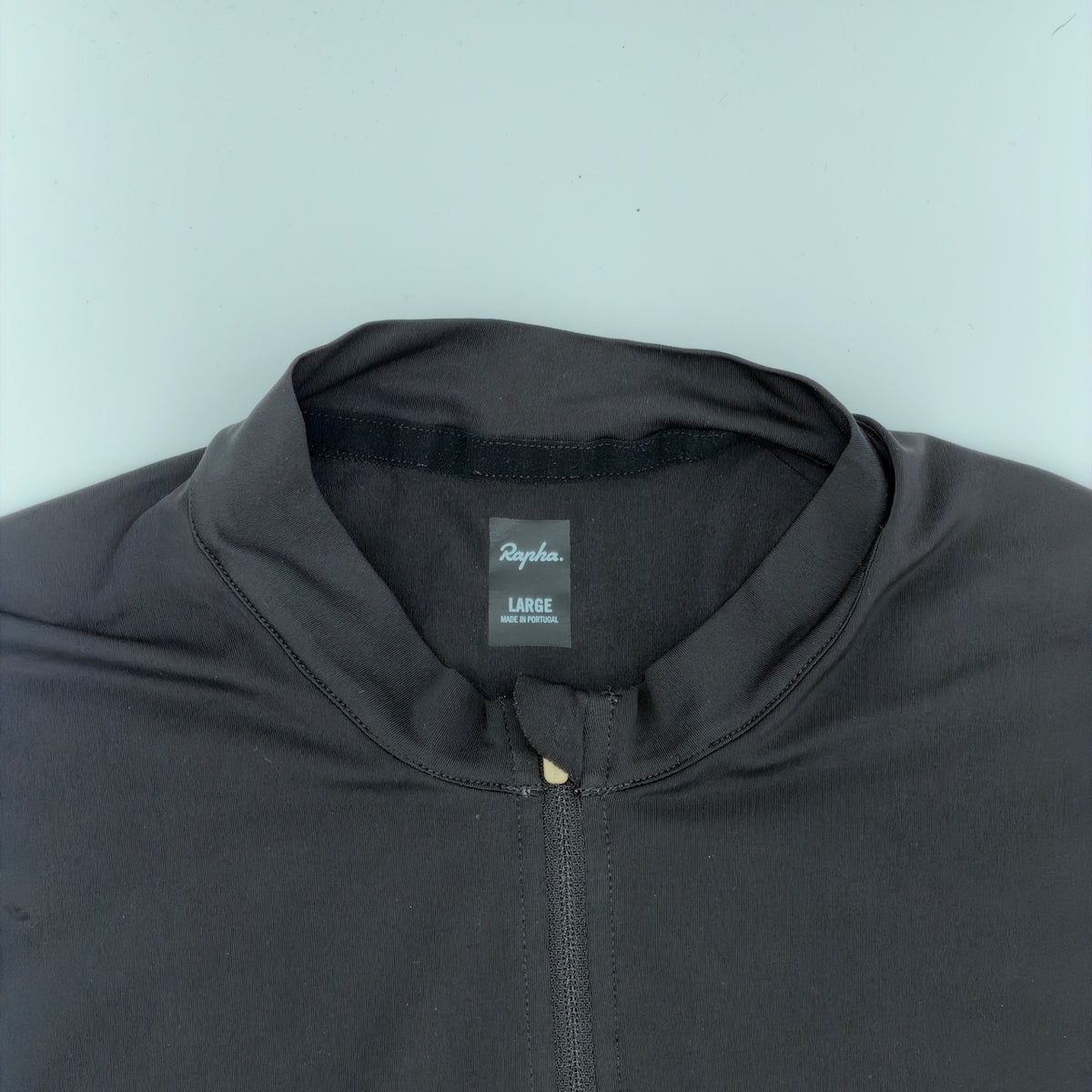 Rapha neck label confirming size Large, made in Portugal