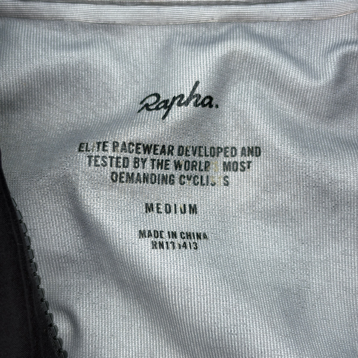 Printed neck label confirming size Medium, made in China
