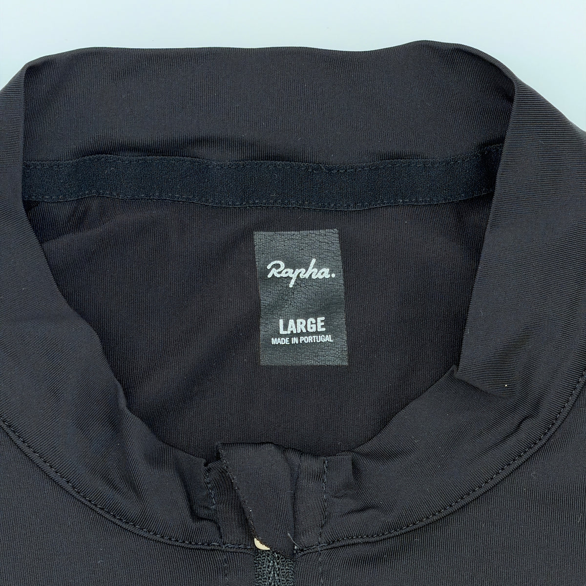 Rapha neck label confirming size Large, made in Portugal