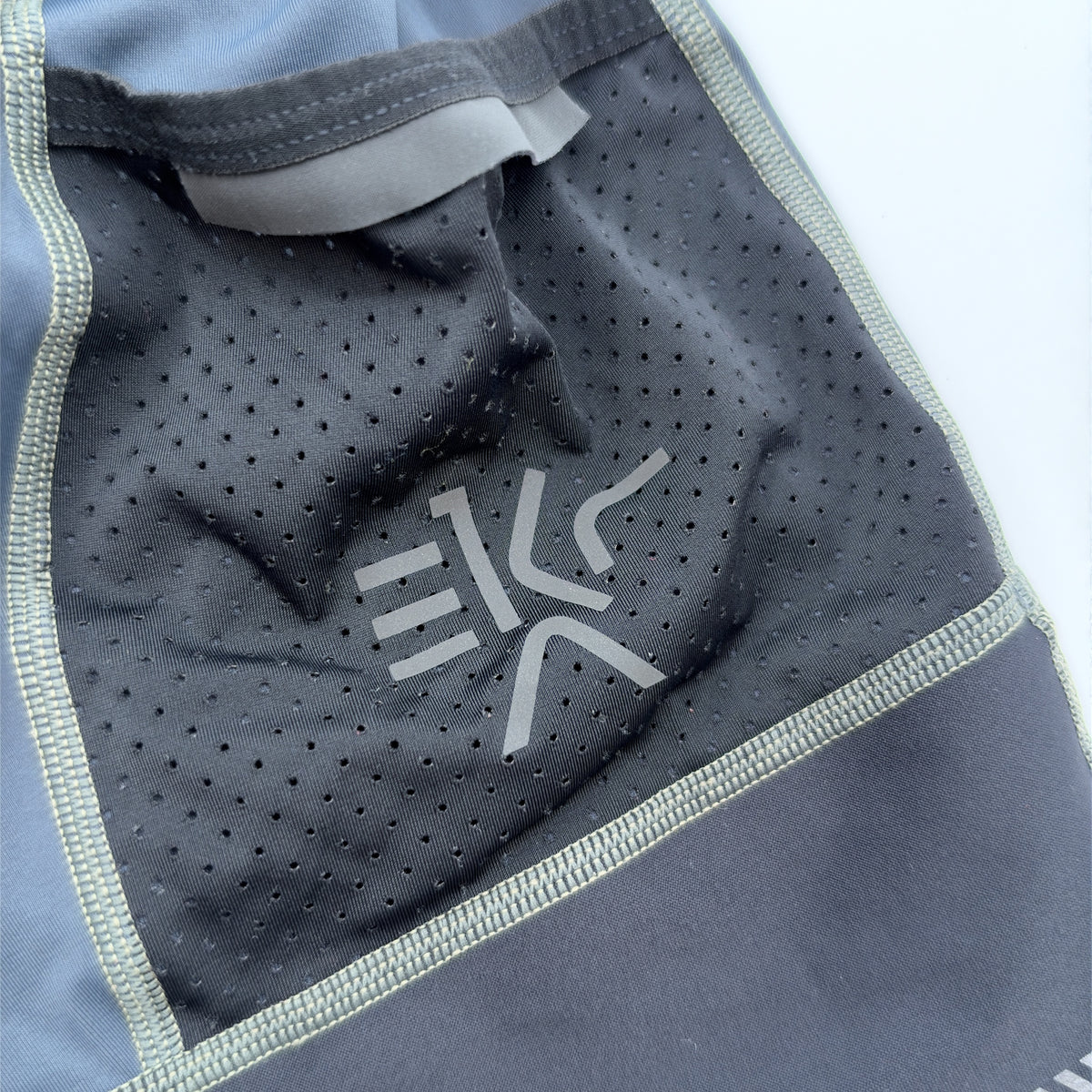 Ekar logo on the perforated leg panel