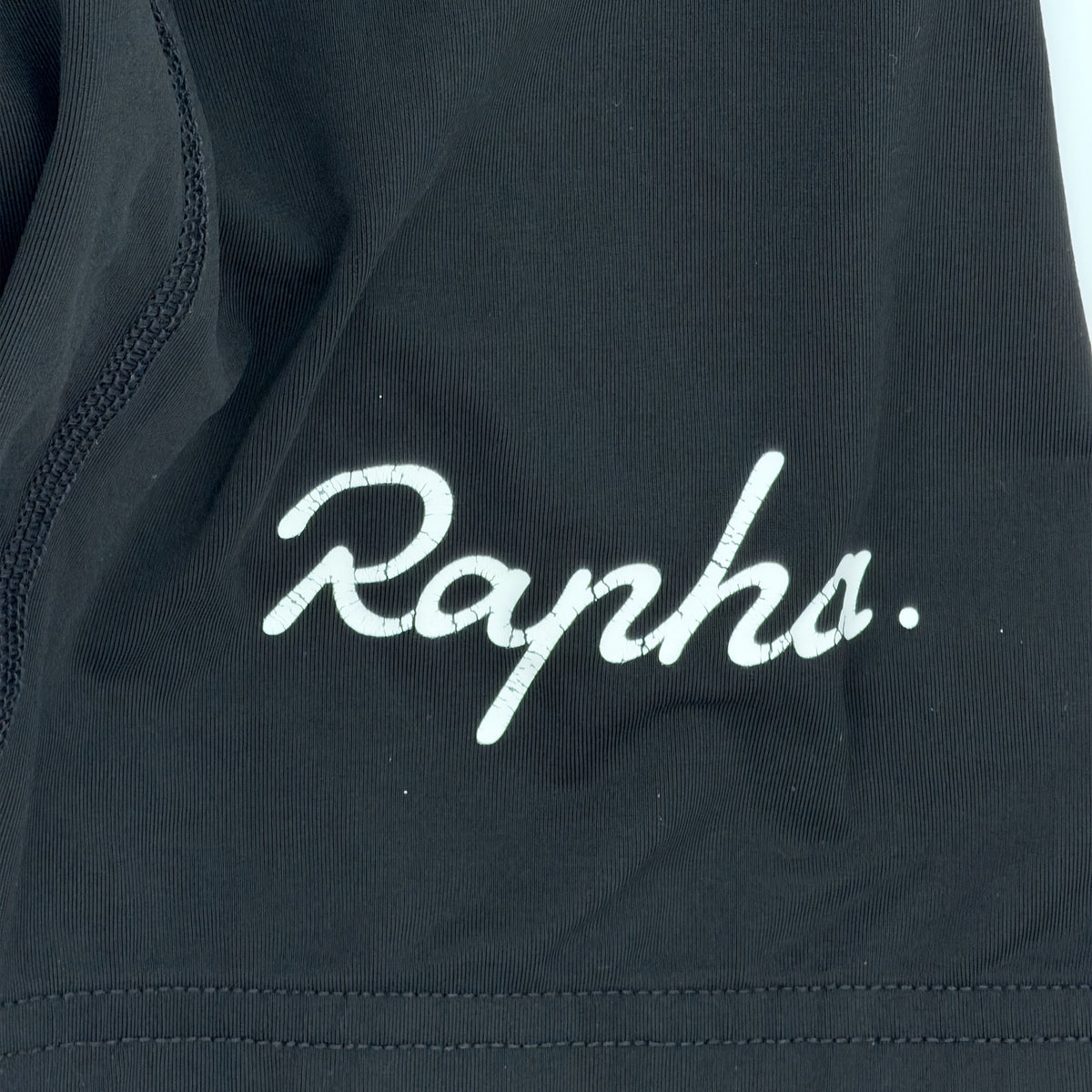 Rapha logo on the leg
