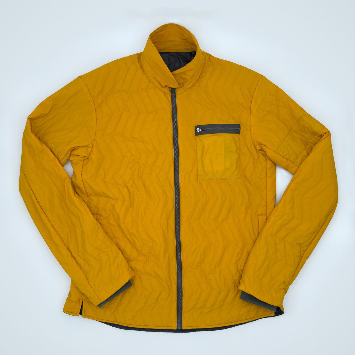 Rapha Reversible Jacket flat front view, mustard side